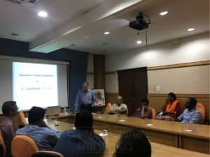 Faculty giving a guest lecture at Chinmaya IAS Academy